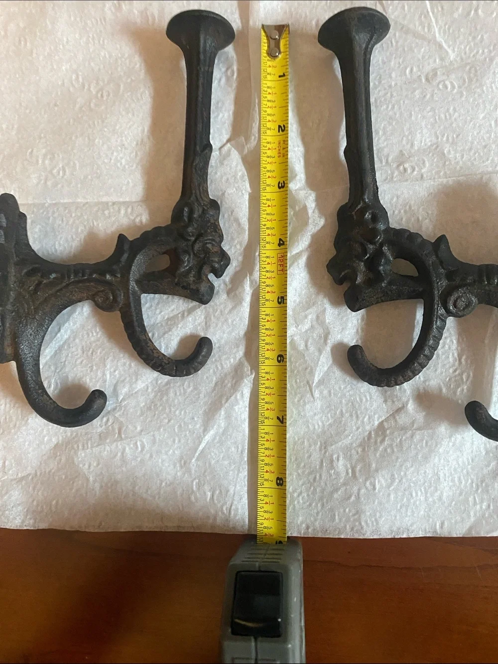 Vintage pair of cast Iron wall hooks. Lion’s head
